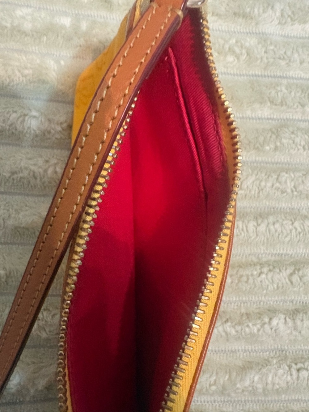Dooney & Bourke Dandelion Coated cotton/orange Embossed DB Wristlet w/Brown Trim - Picture 6 of 8